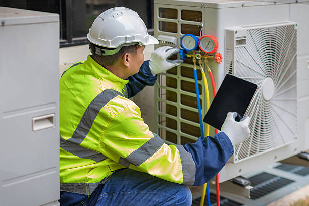 Professional Air Duct Cleaning technician working in Laramie, WY